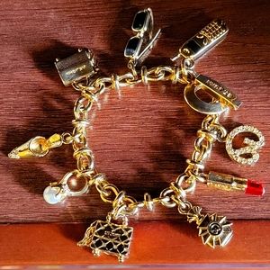 St. John Vintage 9 Piece Charm Gold Plated Bracelet